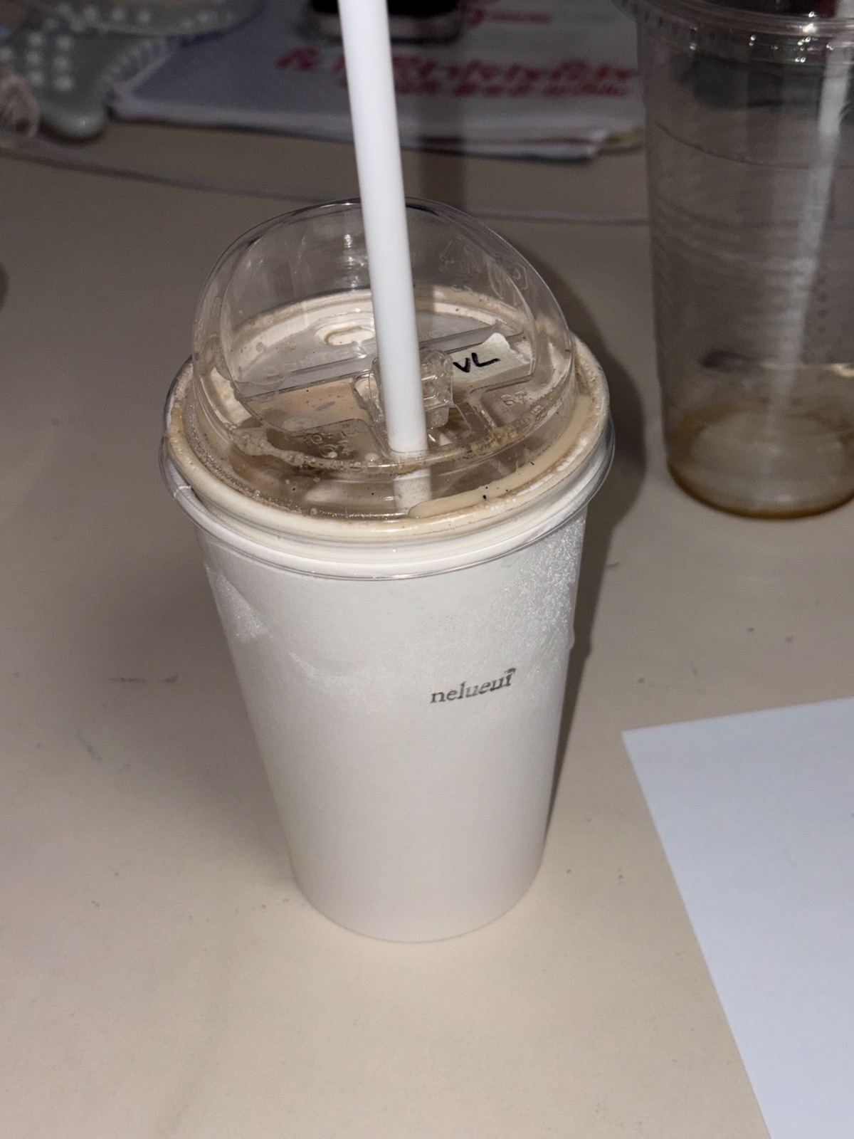 An iced vanilla latte ordered at Nelueui 카페 느루의에서 픽업한 아이스 바닐라 라떼 테이크어웨이