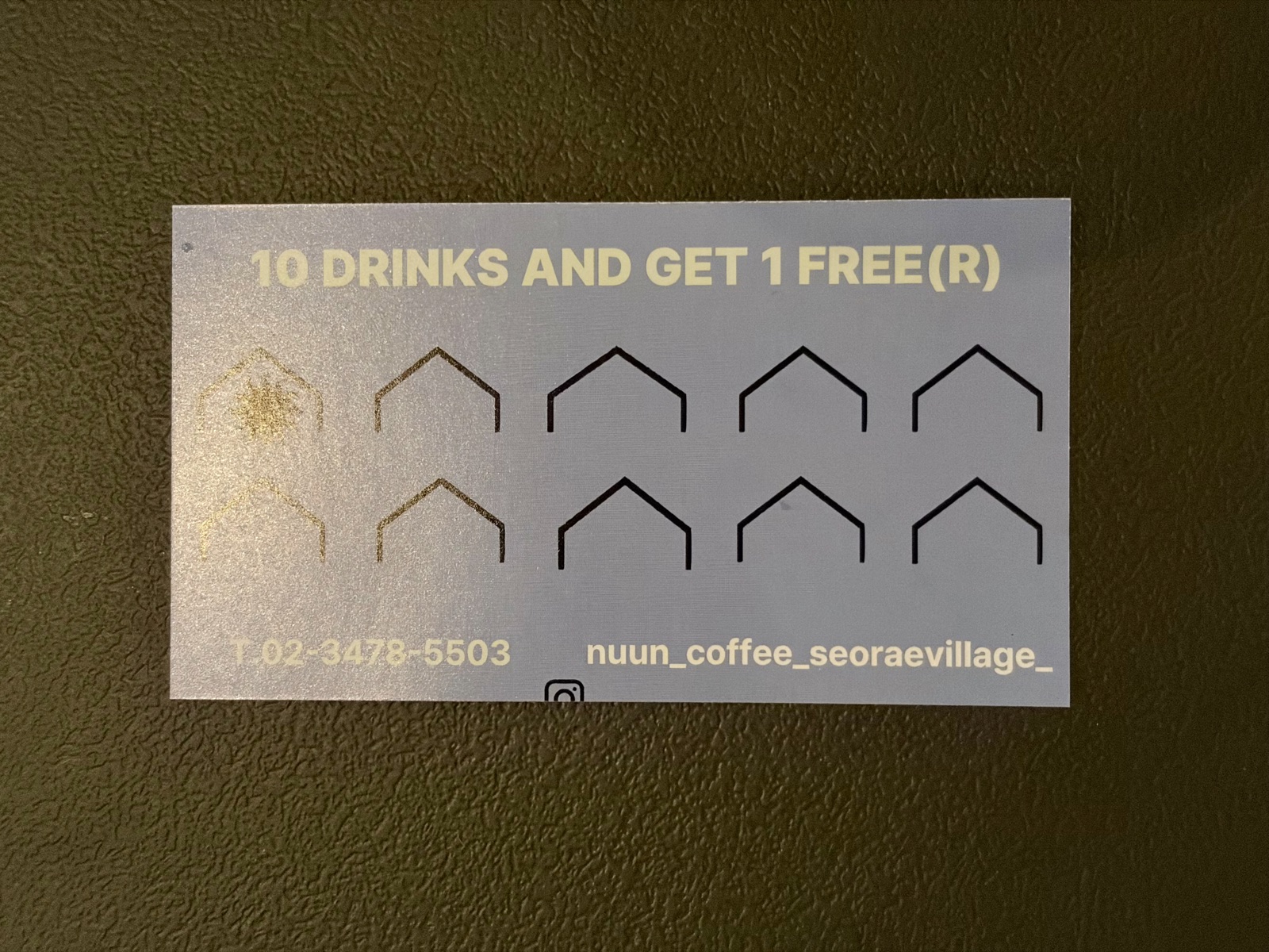 A coupon card with a single stamp on it 스탬프가 하나 찍혀 있는 쿠폰 카드